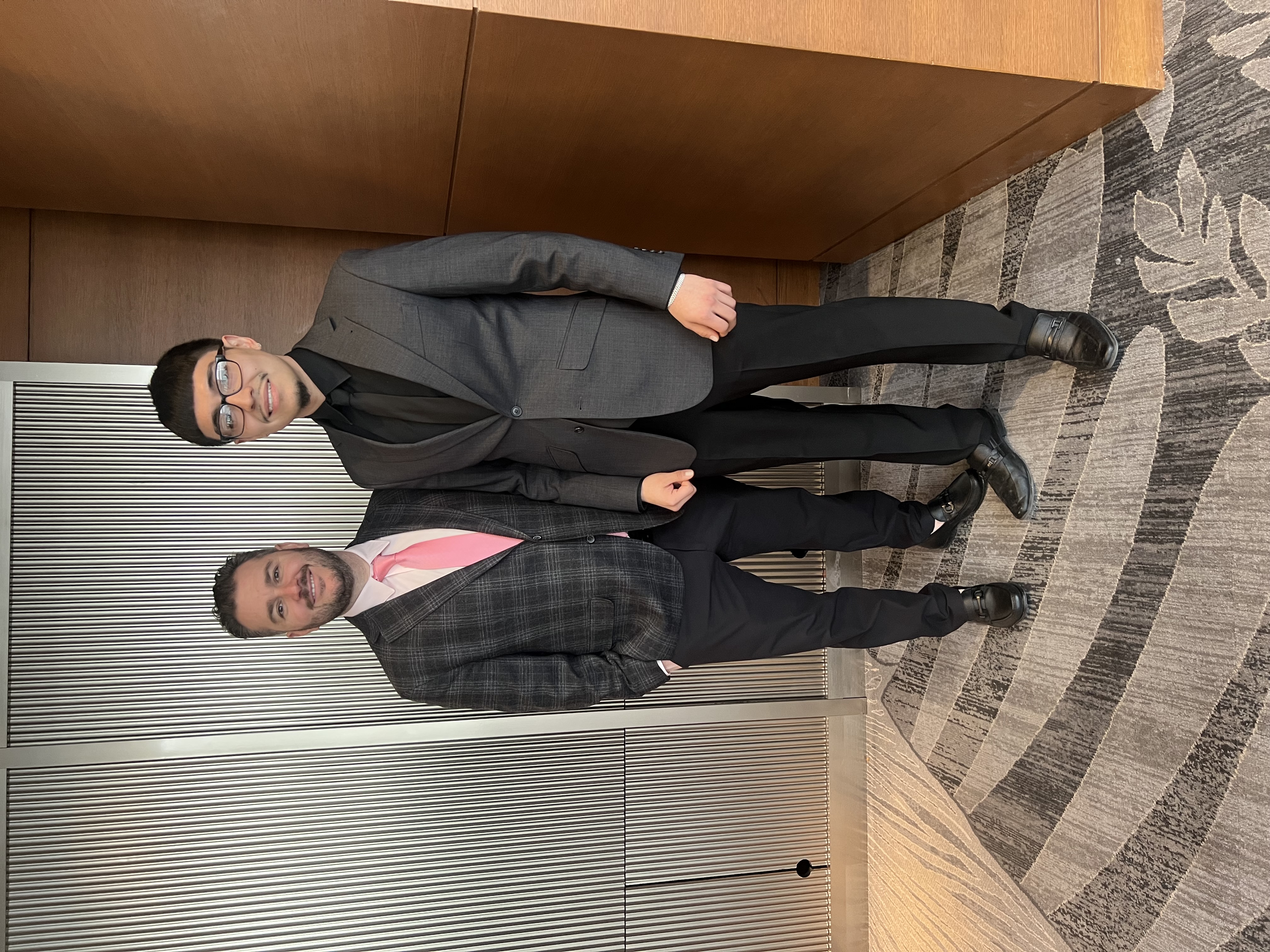 Apatheia Systems team members at professional event